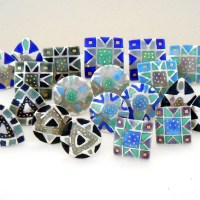 Selection of etched and enamelled earrings