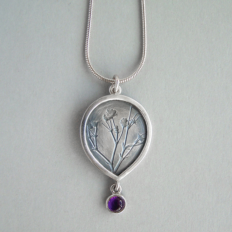 Naomi James - Amethyst Teardrop flower framed pendant
